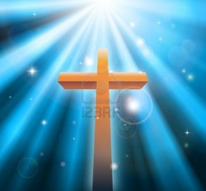 12063502-christian-religion-cross-crucifix-bathed-in-light-rays